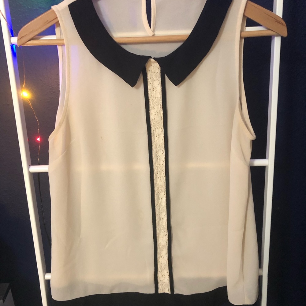 Classy black and white sleeveless top